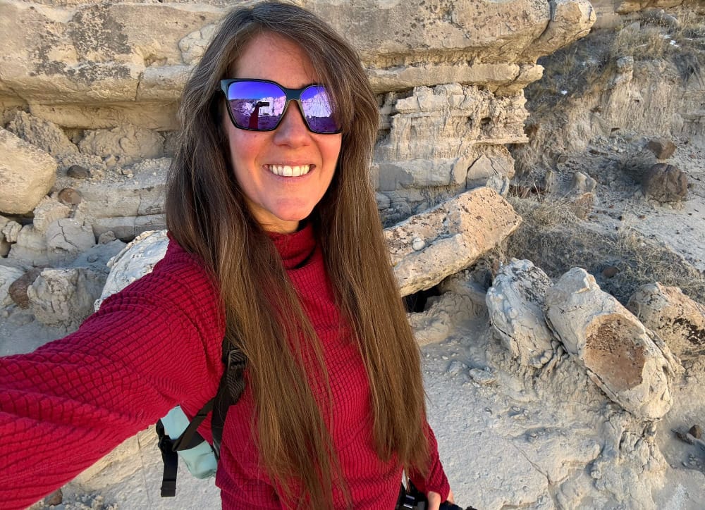 a woman on a hike taking a selfie in the southwest desert with bajio eldora sunglasses on