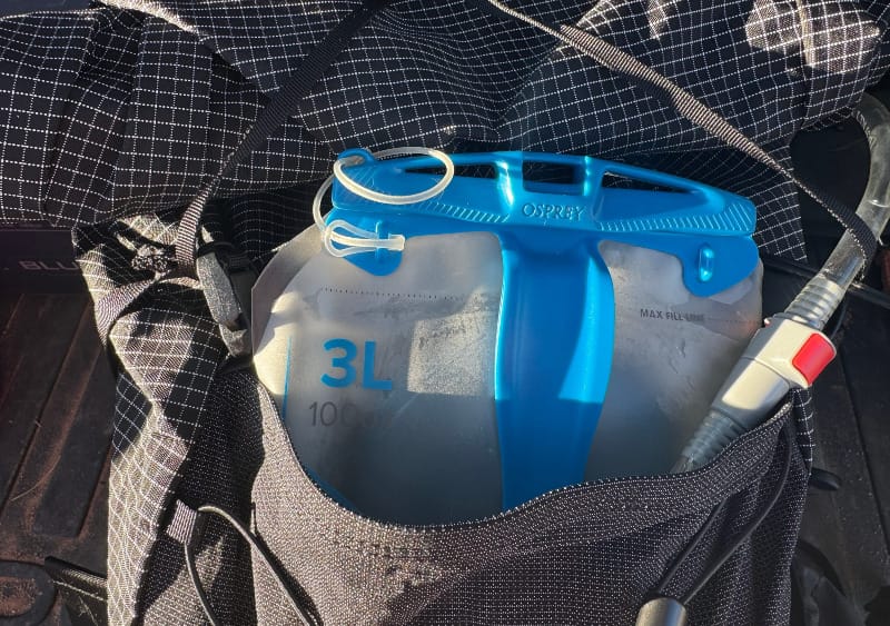 The Aspen Ultralight Backpack By Symbiosis Gear being used with a hydration bladder on a dayhike