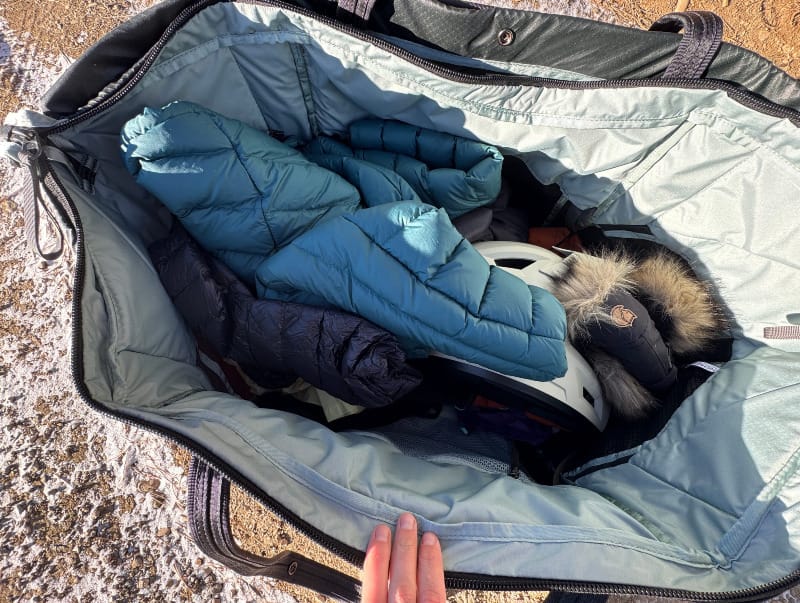 showing the capacity of the Double Haul 100 Liter Convertible Duffel & Tote By NEMO Equipment outside