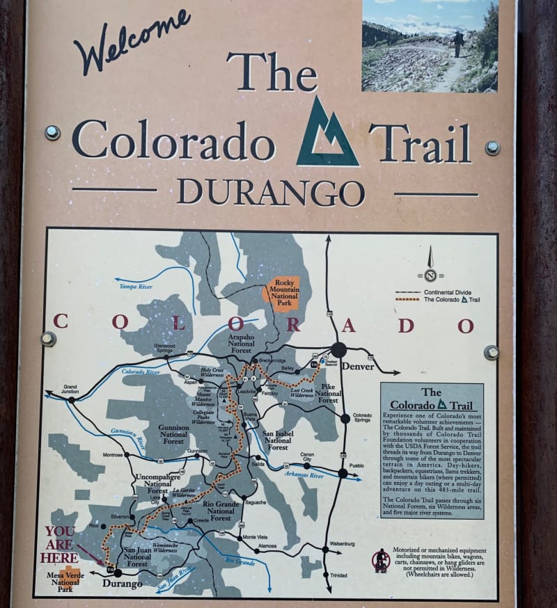 Map of the Colorado Trail posted in Durango, Colorado showing trail route, forest boundaries, and overview information.