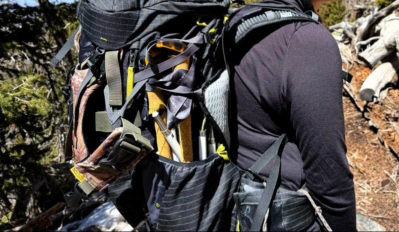 a hiker with leki trekking poles cressida folded down
