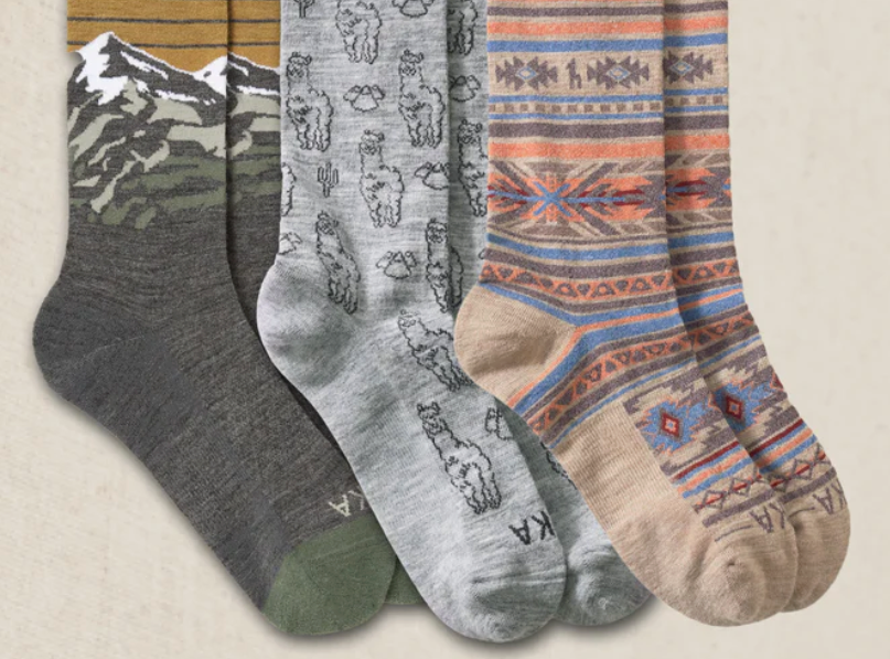 Three pairs of PAKA alpaca socks in the Graphics Box set, featuring mountain, alpaca, and Andean textile-inspired designs. These styles also come in basic solid colors.