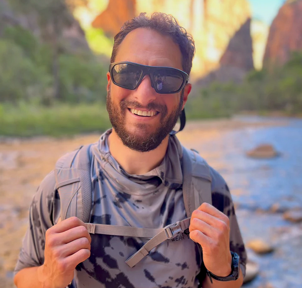 the founder of RecPak named deed in a gorgeous canyon backpacking setting