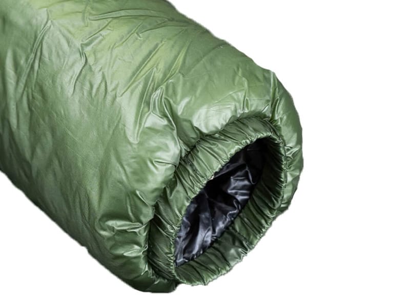 Sleeve of the Enlightened Equipment Torrid Jacket showing elastic cuff detail and lightweight green fabric.
