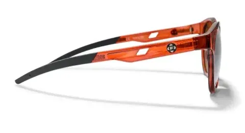 Side view of FKT Gear High Lonesome sunglasses showing red translucent frame and black temple arms.