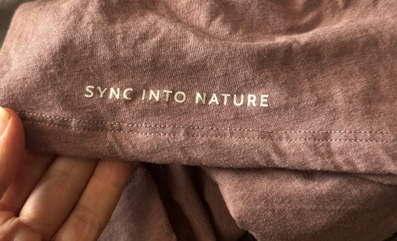 Close-up of “Sync Into Nature” printed on PAKA Essentials fabric