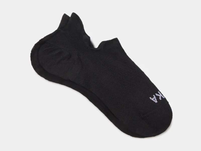 Black PAKA Trail Ankle Socks shown flat with padded heel and ankle tab visible