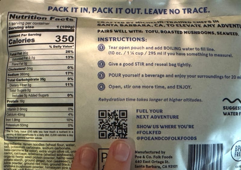  Nutrition label and cooking instructions on the back of the Poe & Co Black Garlic Ramen Bowl dehydrated meal pouch.
