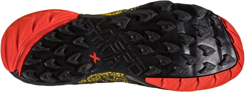 La Sportiva Akasha II trail runners on rocky terrain, showing durable outsole and cushioned midsole for technical hikes.