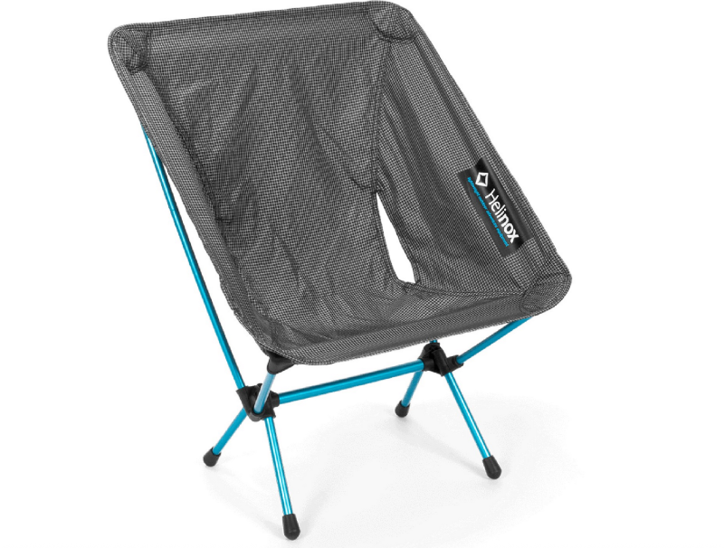 Helinox ultralight backpacking camp chair with blue frame and mesh seat.