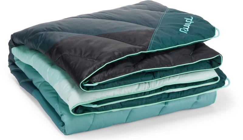 Rumpl puffy insulated blanket in teal and black, folded neatly for portability.