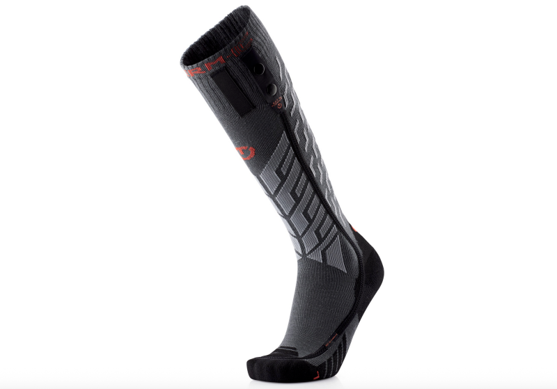 Black and gray heated ski sock with built-in battery connection for warmth.