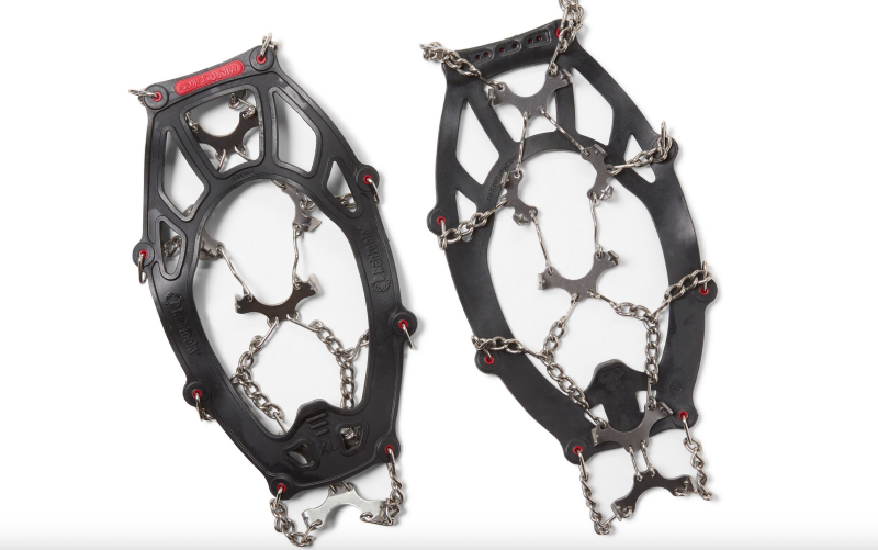 Pair of Kahtoola MICROspikes traction devices with stainless steel chains and black harness.