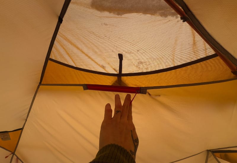 Interior view of NEMO Kunai 4-Season Tent with mesh window panels for airflow and weather protection.”
