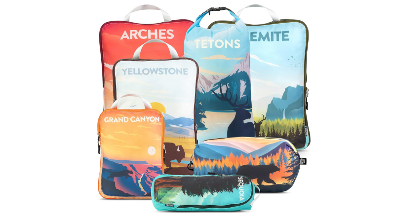 “Set of colorful packing cubes printed with national park artwork, including Arches, Yellowstone, the Tetons, Yosemite, Grand Canyon, and Sequoia.”