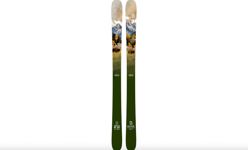 Pair of skis featuring an illustrated Grand Teton National Park landscape with mountains, fall trees, and grazing bison.
