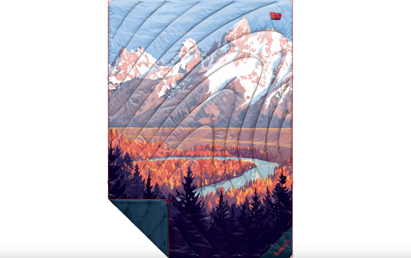 Rumpl puffy blanket with a colorful illustration of Grand Teton National Park showing mountains, forests, and a river.