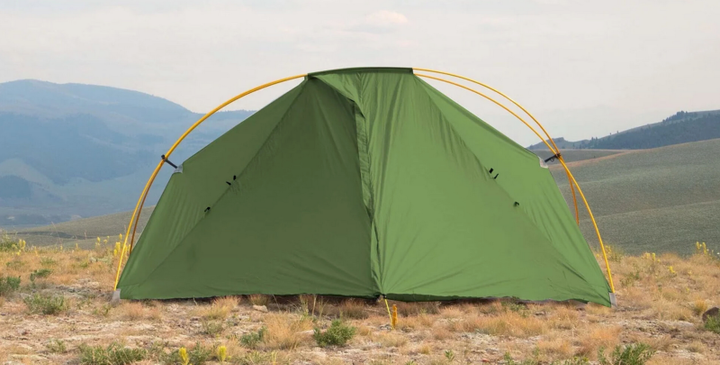 Six Moon Designs Lunar Orbiter Ultralight Freestanding Solo Tent pitched in the mountains