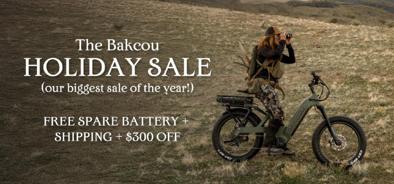 Bakcou 2025 Series off-road electric bike on a rugged mountain trail during the holiday sale, featuring $300 off, free battery, and free shipping promotion.